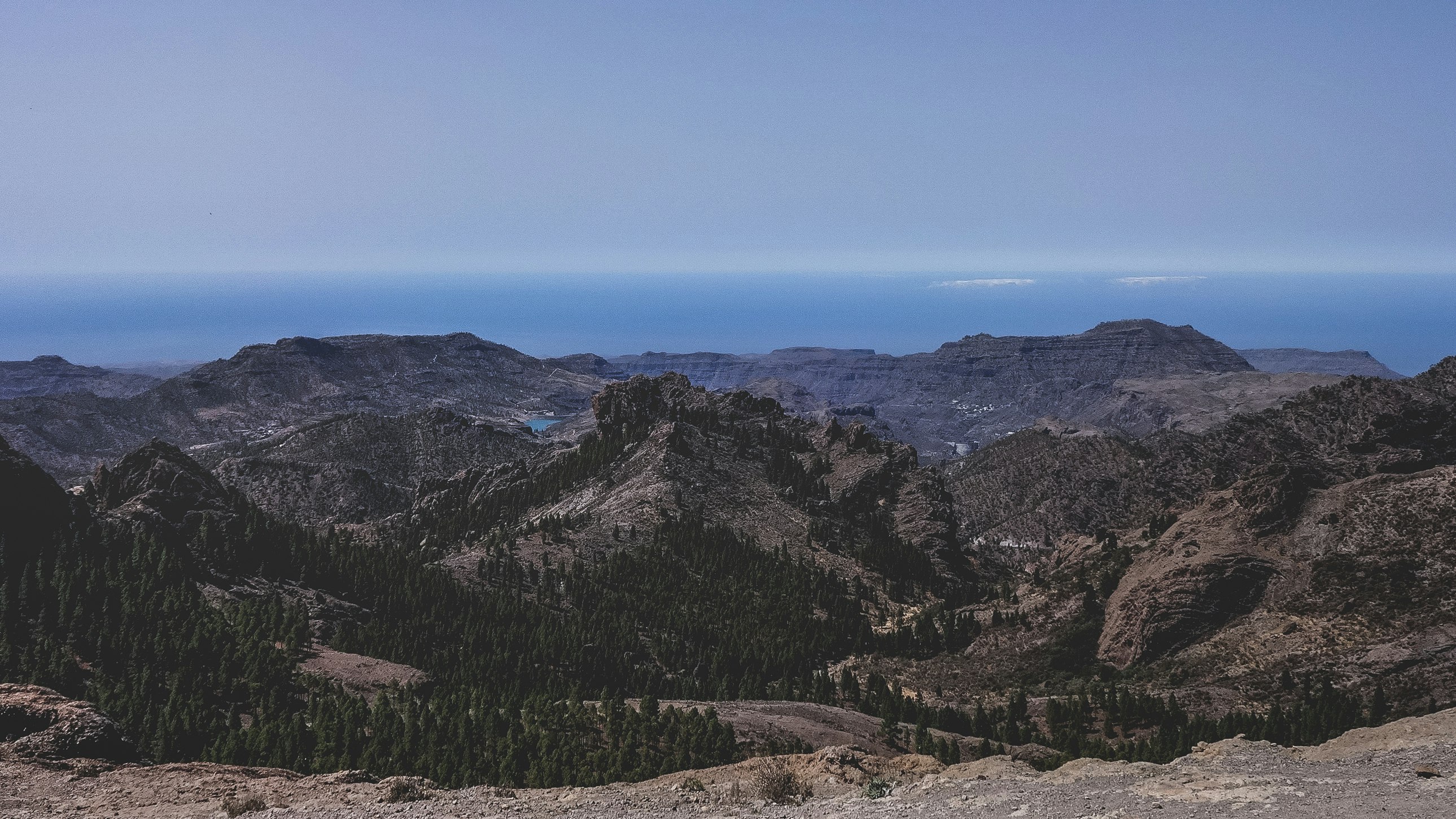 green and brown mountains under blue sky during daytime